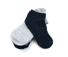 Isolated colorful socks with stripes on white background.