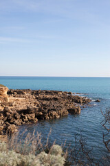 Beautiful mediterranean sea view with stones in sunny day on Sicily, Italy