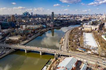 Obraz premium panoramic view from drone on cityscape with river and bridges 