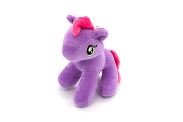 Unicorn plush cute toy isolated on white.