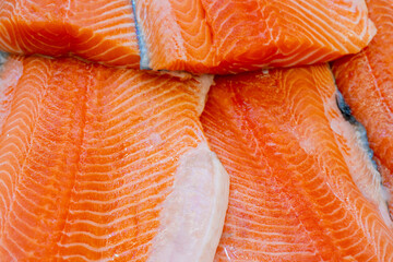 Fresh salmon steaks. Selling seafood in a supermarket.