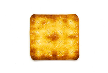 Top view of single crunchy cracker isolated on white background. 