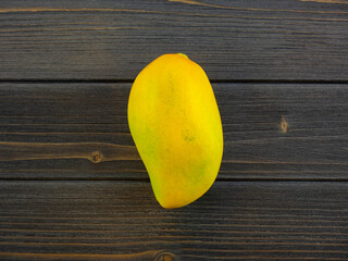 One Mango still life, Nam Dok Mai on the table top view, flat lay fruit