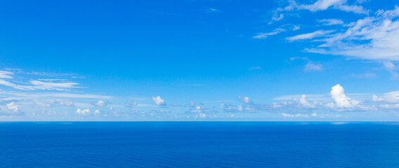 Seascape with sea horizon and almost clear deep blue sky. Earth nature concept. Endless blue ocean...