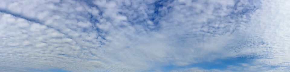 Panorama sky with cloud on a sunny day. Beautiful cirrus cloud.
