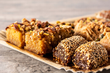 Assortment of Ramadan dessert baklava on wooden table