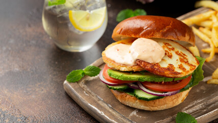 Halloumi cheese Burger with french fries. vegetarian food