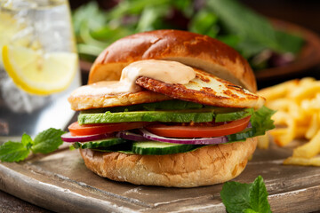 Halloumi cheese Burger with french fries. vegetarian food