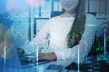 Businesswoman working with laptop, world map and graph changes