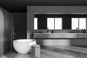 Naklejka na ściany i meble Grey bathroom interior with bathtub and sinks with concrete floor
