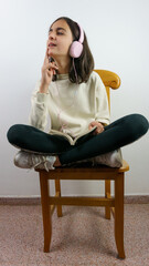 girl reading a book while listening to relaxing music