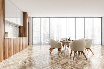White wooden kitchen interior with eating table, kitchen set with window