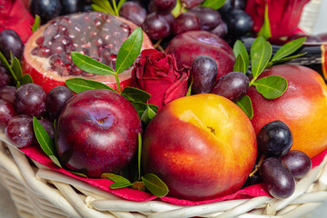 Juicy, fresh fruits, dark grapes and red apples, beautifully presented. Close-up