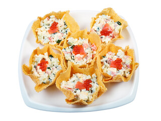 a plate with salad in a cheese baskets