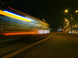 Fototapeta na wymiar night tram motion blur Light Trails