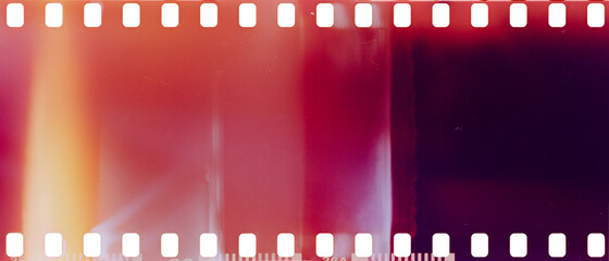 real film strip texture with burn light leaks, abstract background - 423568560