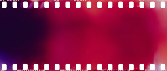 Obraz premium real film strip texture with burn light leaks, abstract background