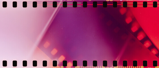 Obraz premium real film strip texture with burn light leaks, abstract background