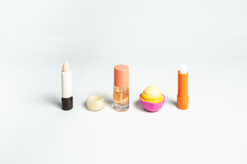 lip care products in a row on a white background