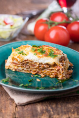 lasagna on a green plate