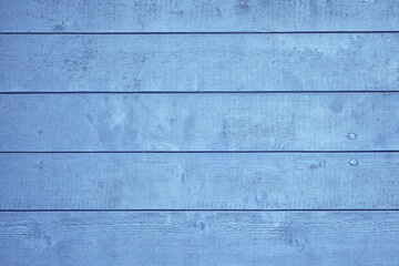 Naklejka premium Wooden background with blue colored planks 