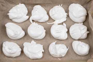 Fototapeta na wymiar meringue on parchment paper cooking process