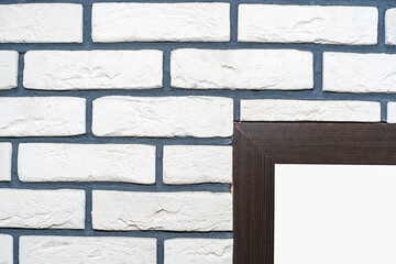 Decorative brick wall. Wall cladding with white panels similar to natural masonry. Close-up