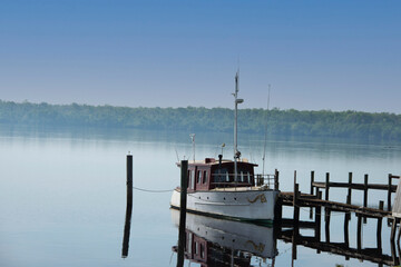 Vintage wooden powerboat at the dock on the St Johns River