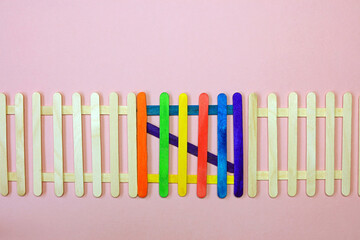 A Colourful Gate Made From Lollipop Sticks