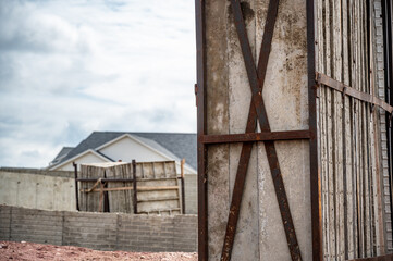 Obraz premium Stacked removable concrete forms for a basement at a residential home construction site