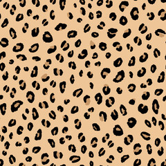 Abstract modern leopard seamless pattern. Animals trendy background. Beige and black decorative vector stock illustration for print, card, postcard, fabric, textile. Modern ornament of stylized skin