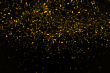 Bright and dark yellow and golden little stars blur bokeh on black background. Design element for overlay