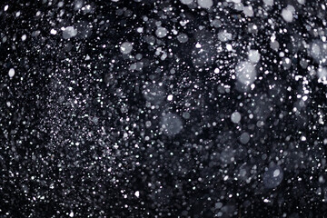 Real falling snow on black background for blending modes in ps. Ver 04 - many snowflakes in blur