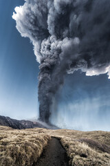 Incredible and frightening eruptive event of the Etna volcano, huge column of smoke in the sky. Catania - Sicily