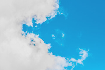 Soft large white cloud on blue sky background of atmosphere and air