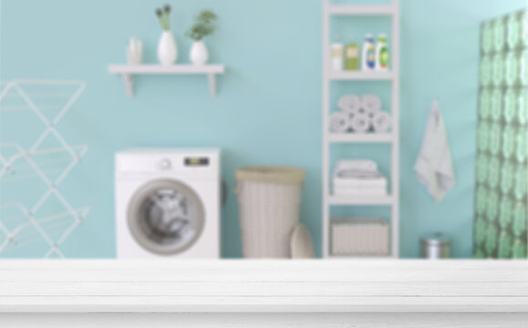 Empty Wooden Table In Laundry Blue Room. Mockup For Your Design.