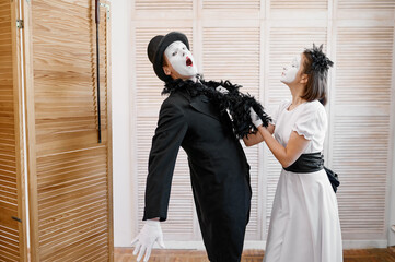 Two mime artists, love couple parody