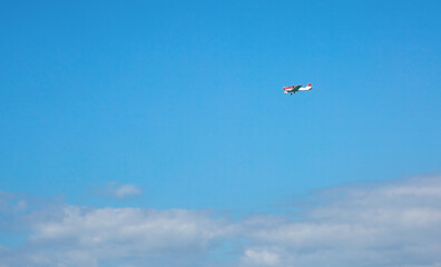 light single-engine aircraft soaring above