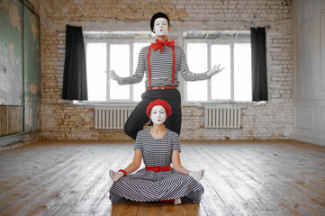 Two mime artists, love couple parody scene