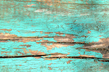 old paint on wood, close-up, as a texture for the background