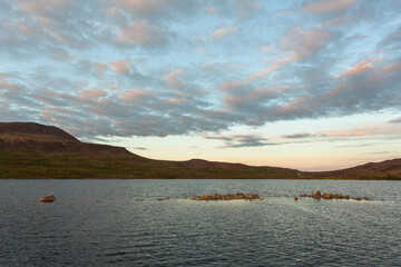 Fototapeta premium Cloudy sky at white night in Monchegorsk