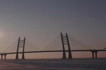 Fototapeta na wymiar bridge over the bay in winter