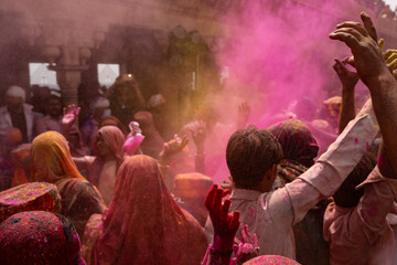 People Playing with colors in Nandgaon Holi - obrazy, fototapety, plakaty