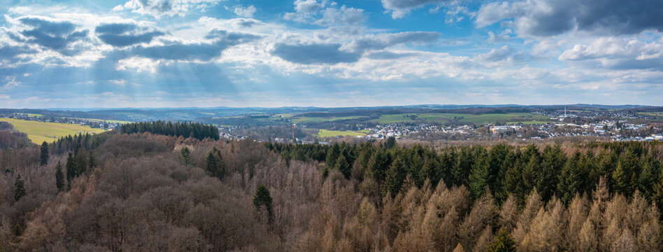 Aerial view over forests and meadows of Westerwald, Altenkirchen, Germany