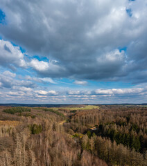 Aerial view over forests and meadows of Westerwald, Altenkirchen, Germany