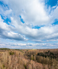 Aerial view over forests and meadows of Westerwald, Altenkirchen, Germany