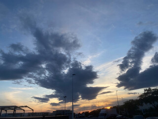 beautiful sunrise in a parking lot by the sea, located in Alicante, Spain.