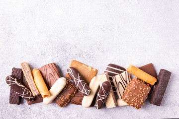 Chocolate chip cookies on gray plaster. Food background. Place for your text. Flat lay.