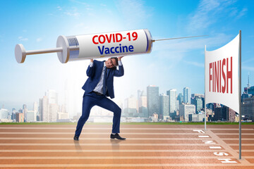 Businessman in covid-19 coronavirus vaccination concept