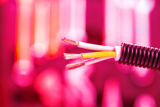 Electric Cable Without Isolation On Background With Bokeh Close Up